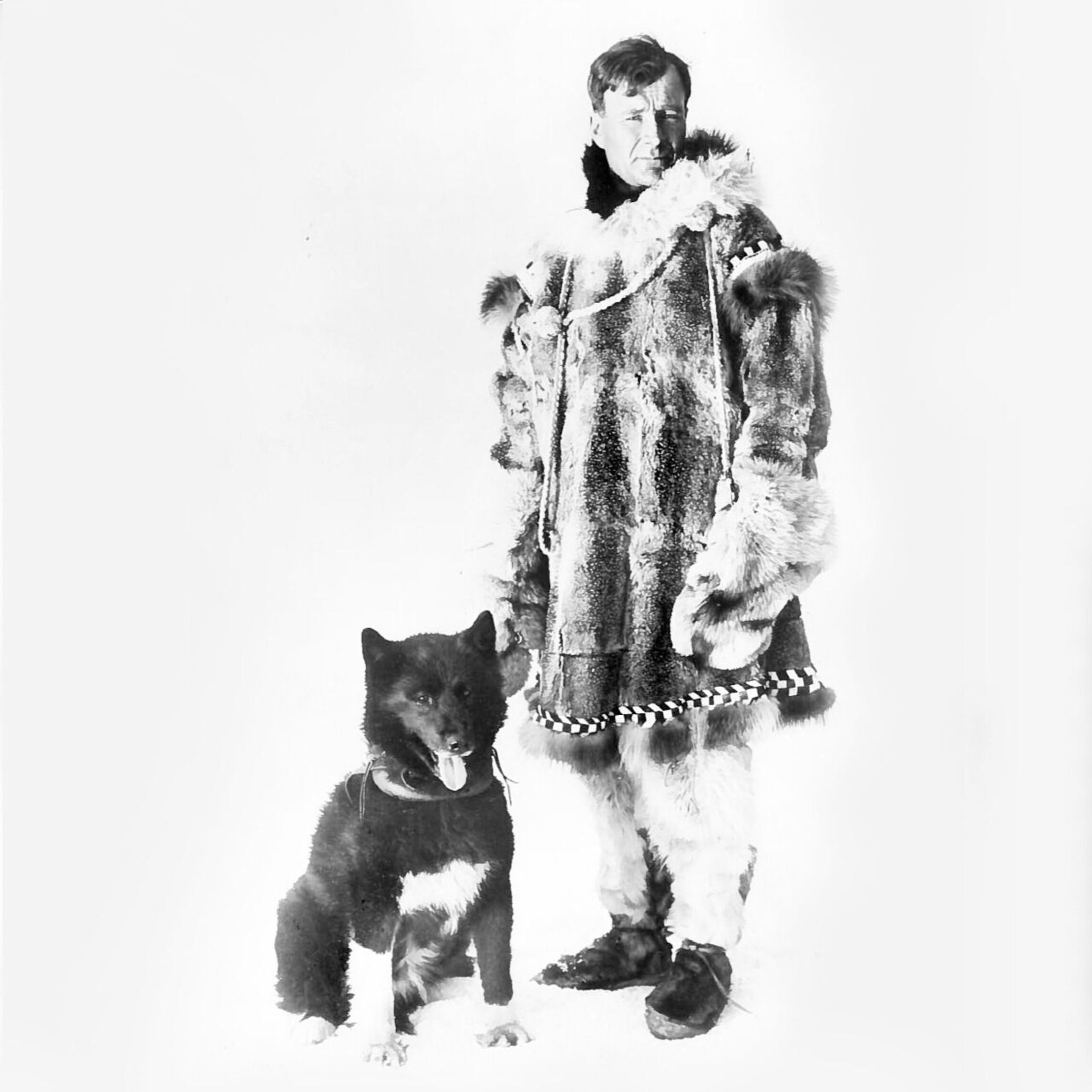 Balto pictured with his musher, Gunnar Kaasen.